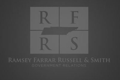 Ramsey, Farrar, Russell & Smith black and white logo.